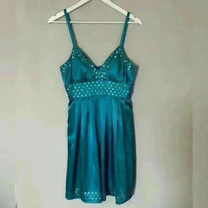 A satin turquoise mini flared dress